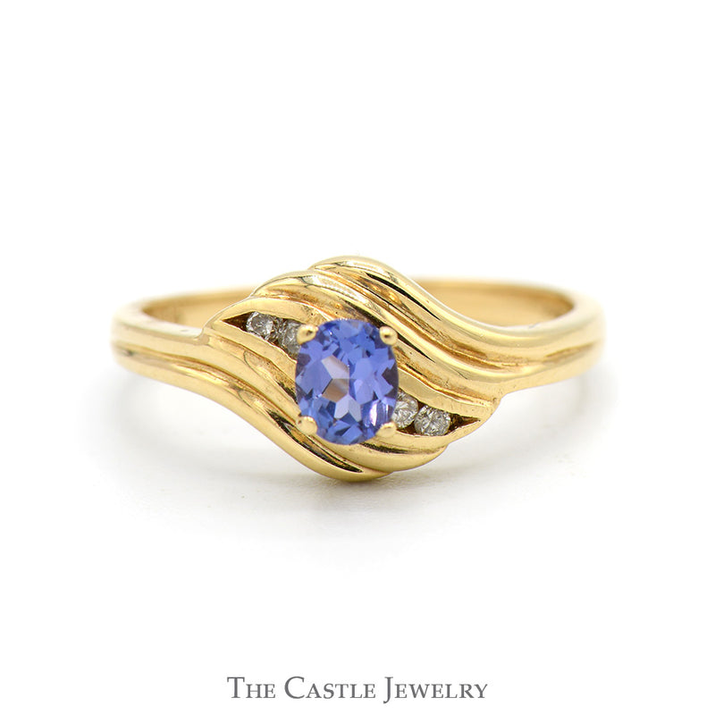Oval Tanzanite Ring with Diamond Accented Sides in 14k Yellow Gold