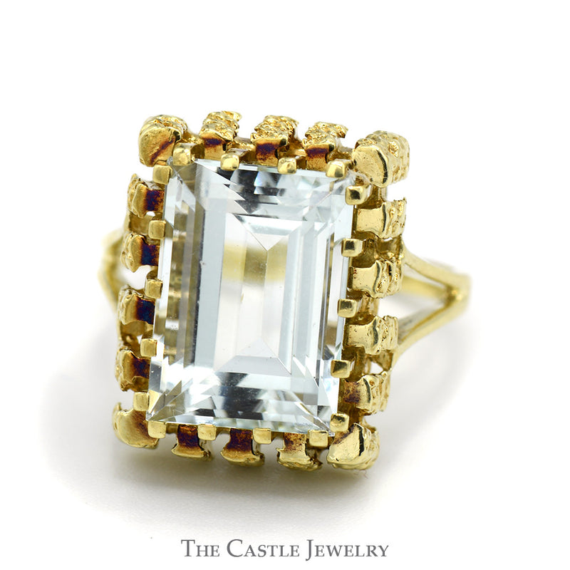 Emerald Cut Aquamarine Ring in 14k Yellow Gold Nugget Style Bezel