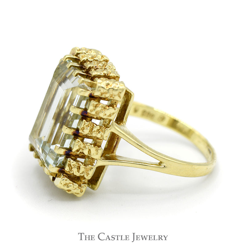 Emerald Cut Aquamarine Ring in 14k Yellow Gold Nugget Style Bezel