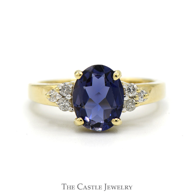 Oval Tanzanite Ring with Diamond Cluster Sides in 14k Yellow Gold