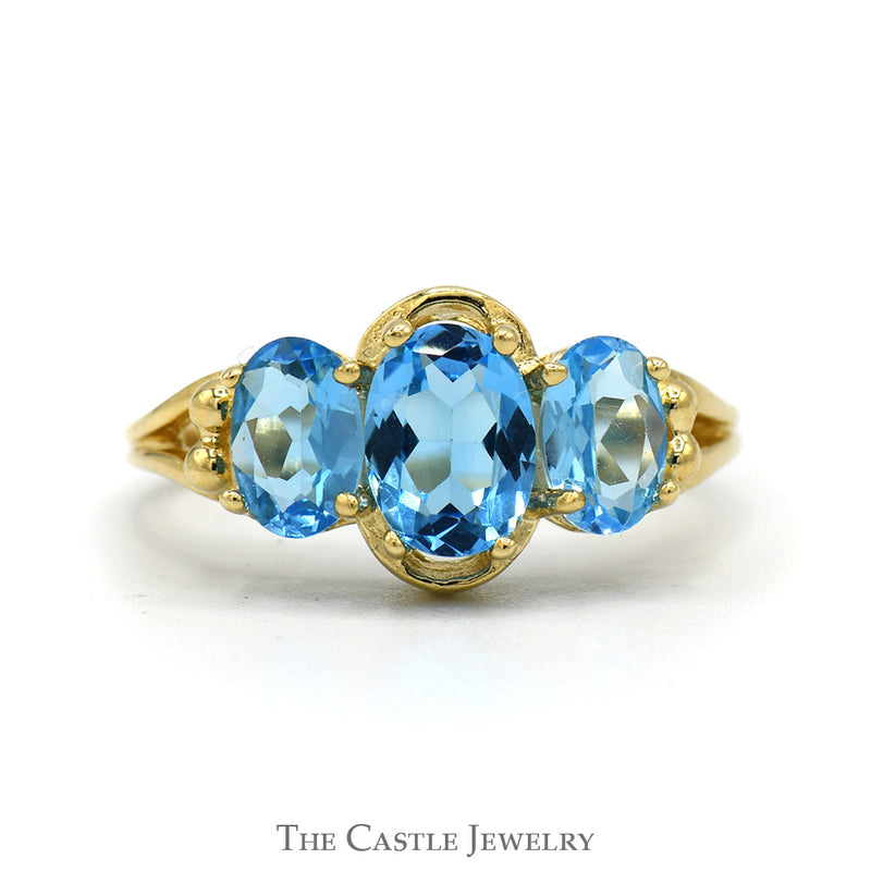 Triple Oval Cut Blue Topaz Ring with Split Shank Sides in 14k Yellow Gold