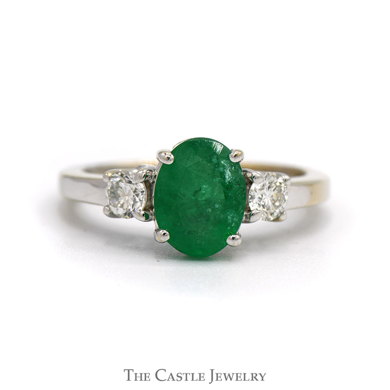Oval Cut Emerald Ring with Diamond Accented Sides in 18k White Gold