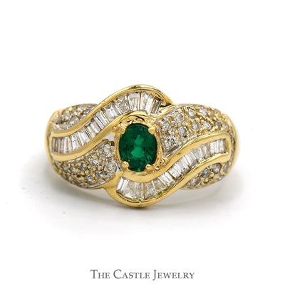Oval Emerald Ring with Baguette and Round Diamond Accents in 14k Yellow Gold