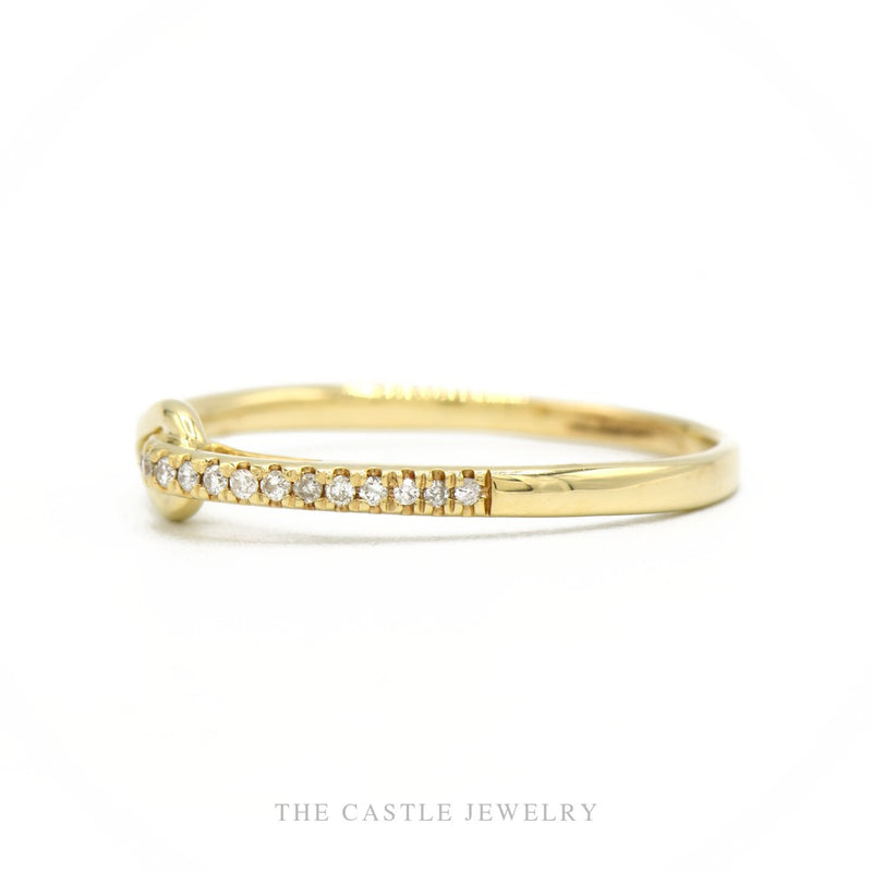 Side profile of the 10k yellow gold delicate diamond band showing band height and looped opening