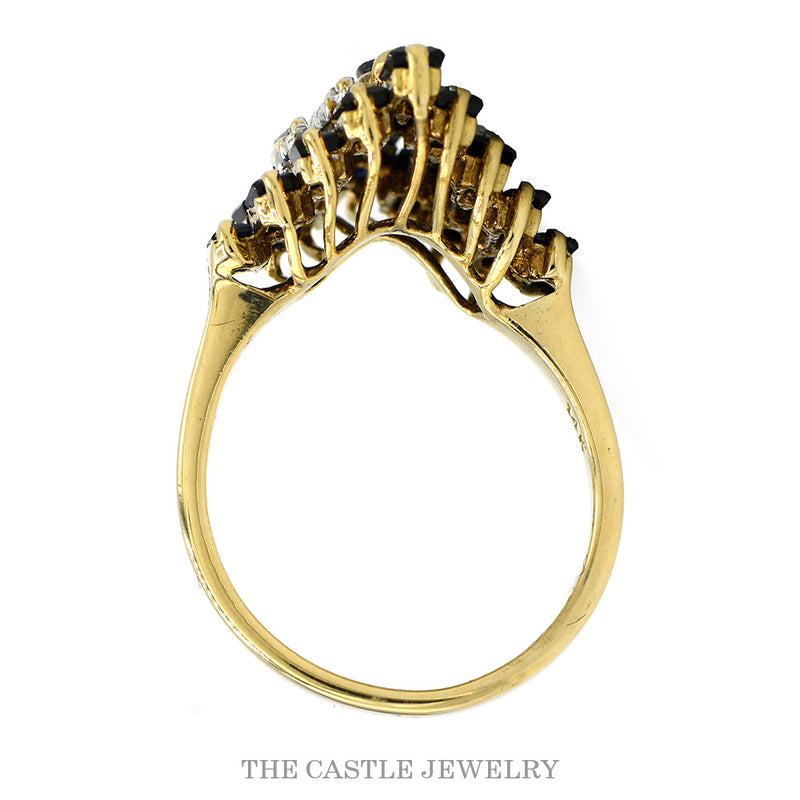 Front-facing view of the 14k yellow gold sapphire diamond cluster ring