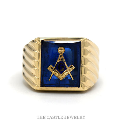 10k yellow gold Masonic square-and-compass ring with blue stone — top view