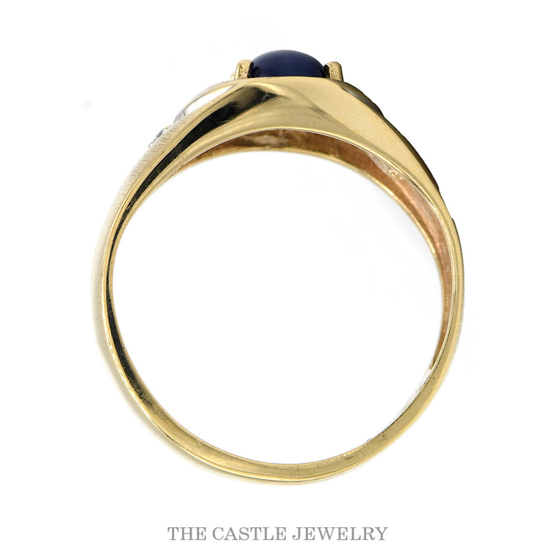 Front-facing view of the 14k yellow gold men's star sapphire ring