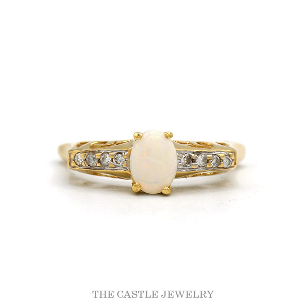 10k yellow gold oval opal ring with diamond filigree shoulders — top view