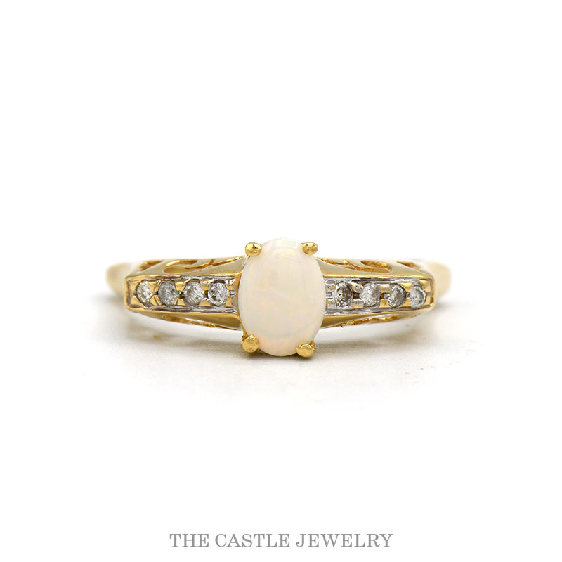 10k yellow gold oval opal ring with diamond filigree shoulders — top view