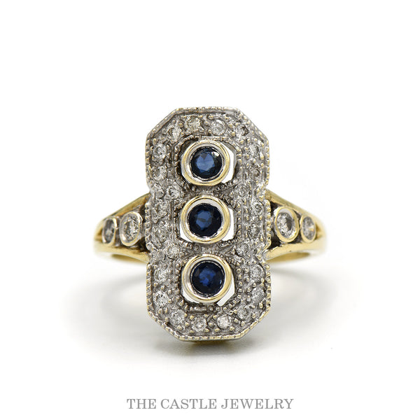 .38cttw diamond shield ring with three bezel-set sapphires in 10k two-tone gold — top view