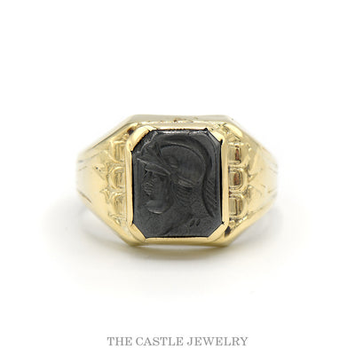 Men's black intaglio ring with fancy engraved shoulders in 10k yellow gold — top view