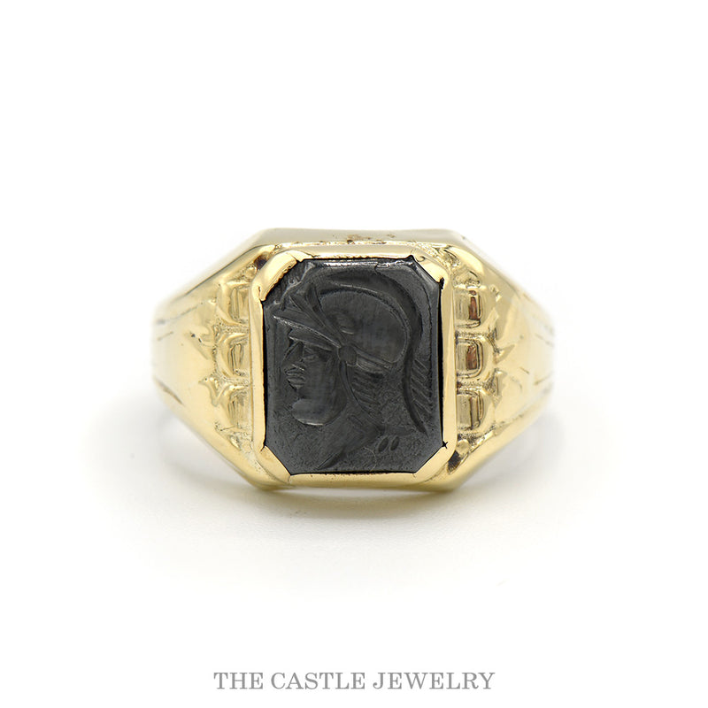 Men's black intaglio ring with fancy engraved shoulders in 10k yellow gold — top view