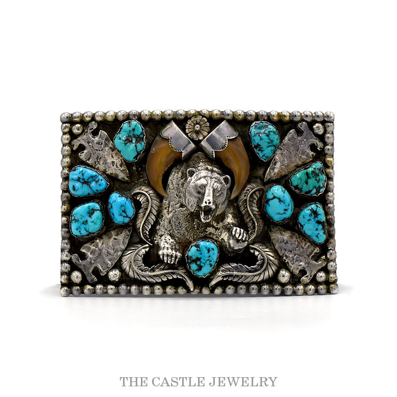 Sterling silver bear belt buckle with silver-capped claws, nugget turquoise, arrowheads and feathers — front