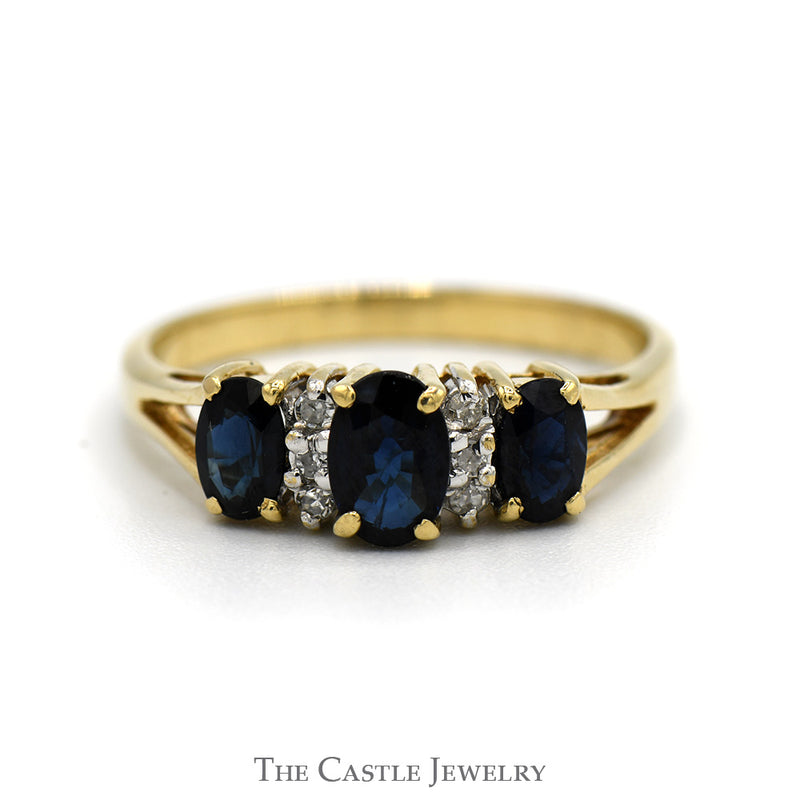Three Stone Oval Sapphire Ring with Diamond Accents in 10k Yellow Gold Split Shank Setting