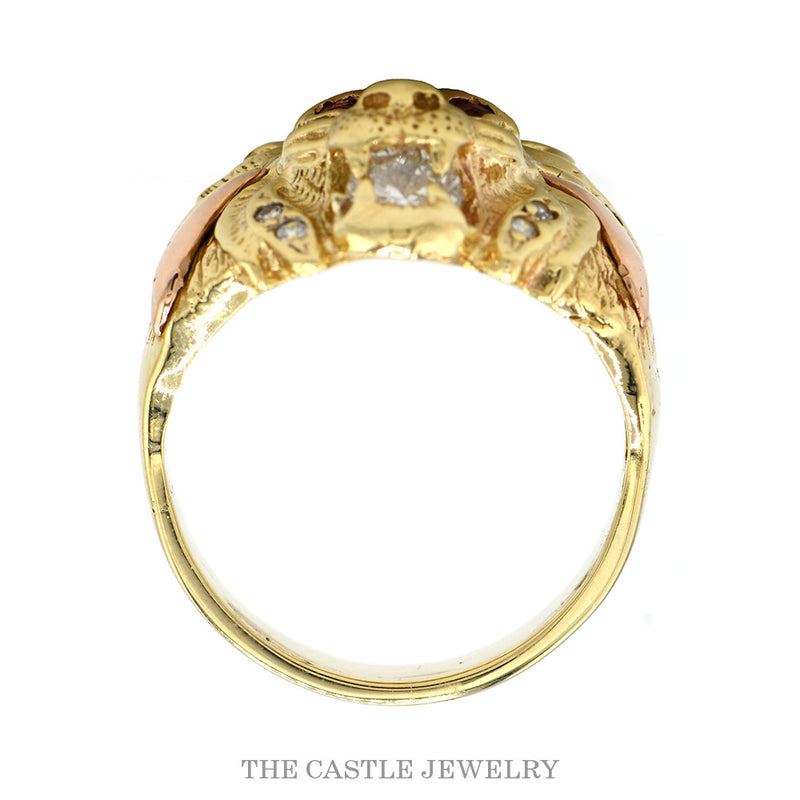 Front-facing view of the 14k yellow gold lion head ring with ruby eyes