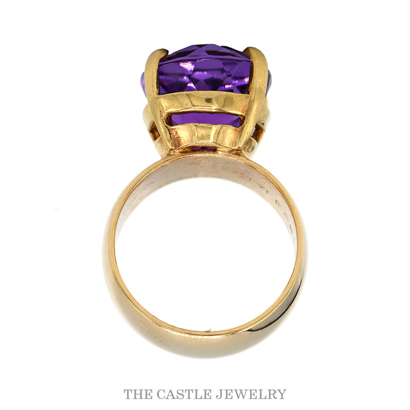Front-facing view of the large oval amethyst solitaire ring on a polished 14k yellow gold band