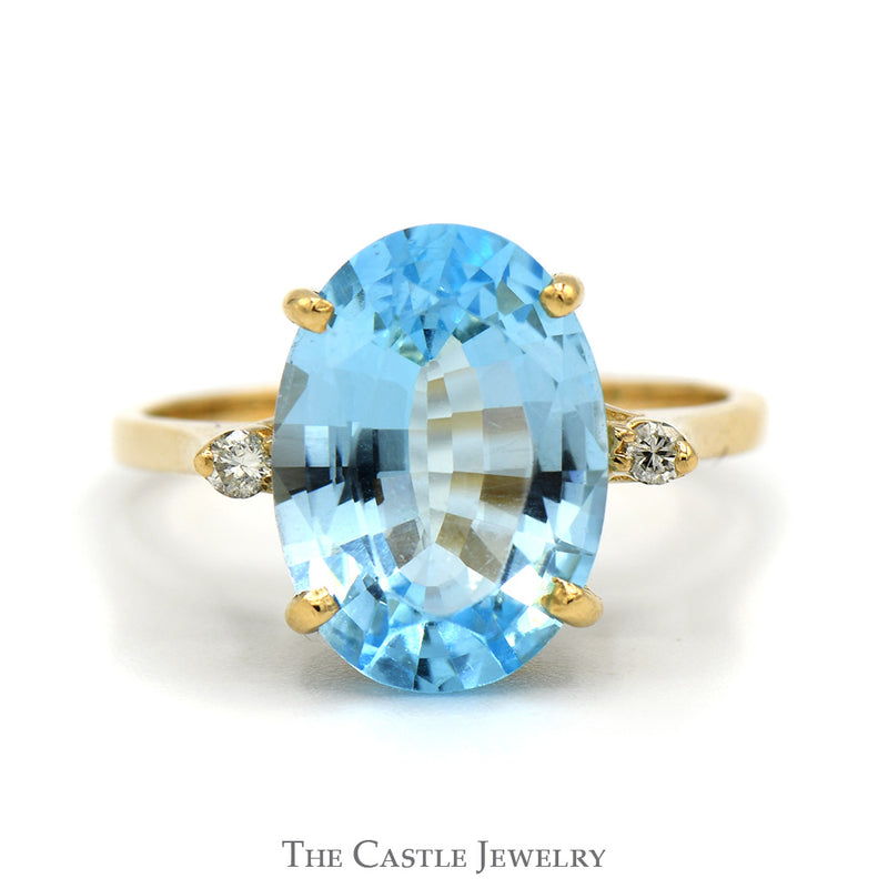 Oval Blue Topaz Ring with Diamond Accents in 10k Yellow Gold