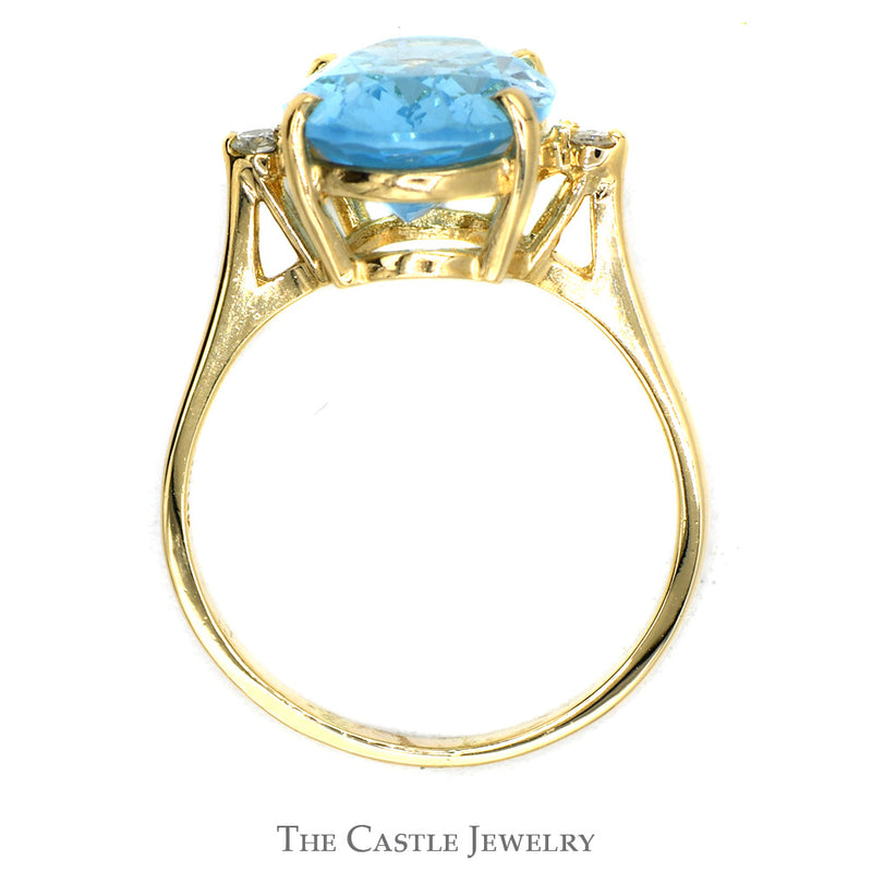Oval Blue Topaz Ring with Diamond Accents in 10k Yellow Gold