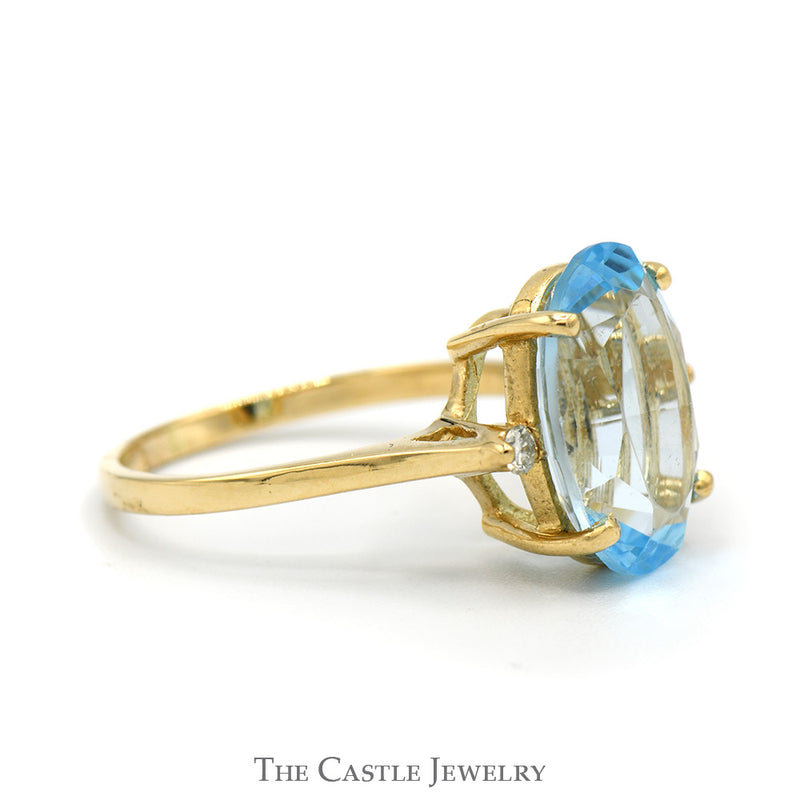 Oval Blue Topaz Ring with Diamond Accents in 10k Yellow Gold