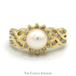 Pearl And Diamond Ring With .25CTTW Round Diamonds In Halo And Crossover Design Sides In 14KT Yellow Gold