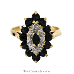Sapphire And Diamond Marquise Shaped Cluster Ring With .04 CTTW Of Diamonds In 14KT Yellow Gold