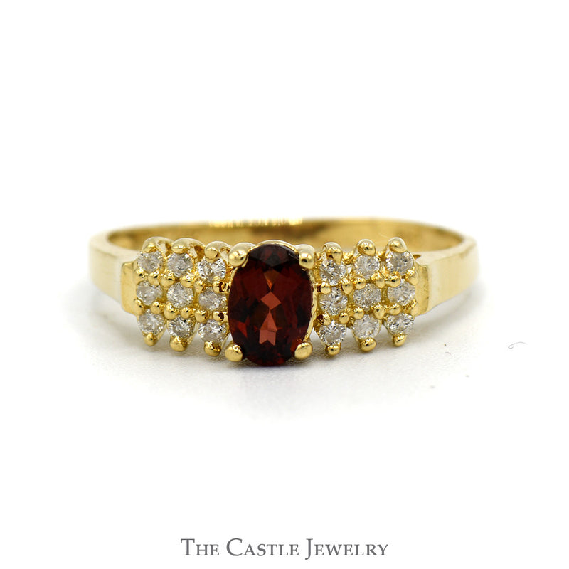 Oval Cut Garnet And Diamond Ring With .18 CTTW Diamonds In 14KT Yellow Gold