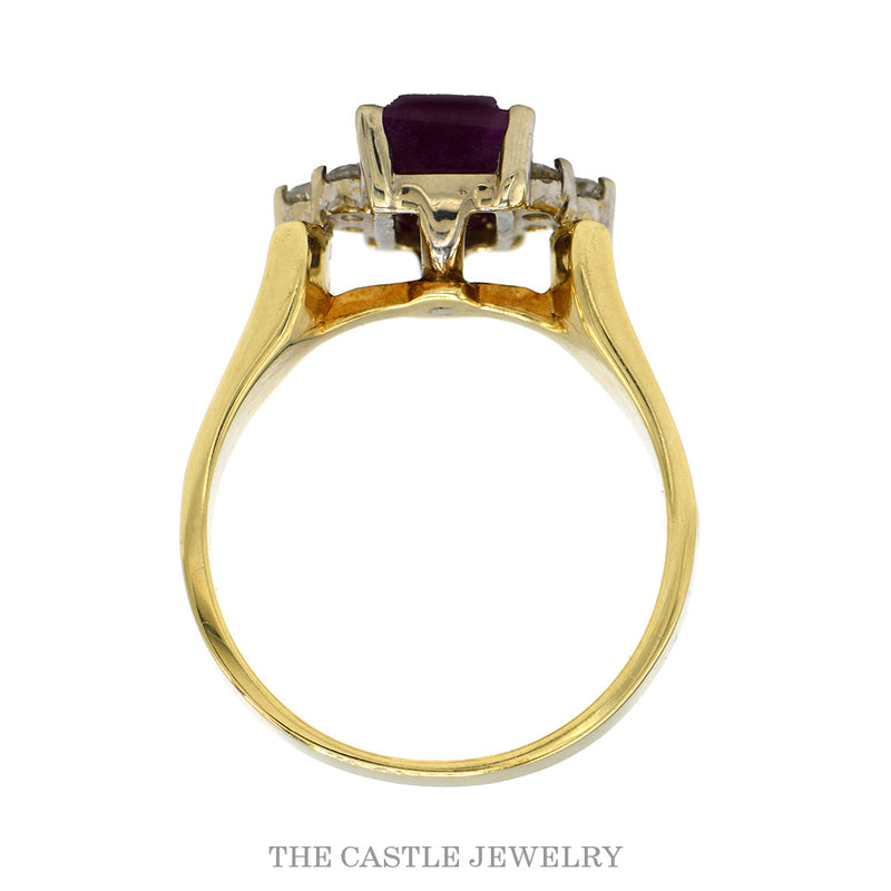 Front-facing view of the emerald cut ruby ring with trios of round diamonds in 14k yellow gold