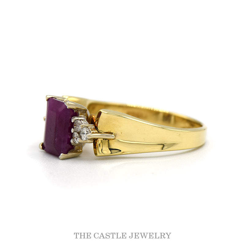 Side profile of the 14k yellow gold emerald cut ruby ring