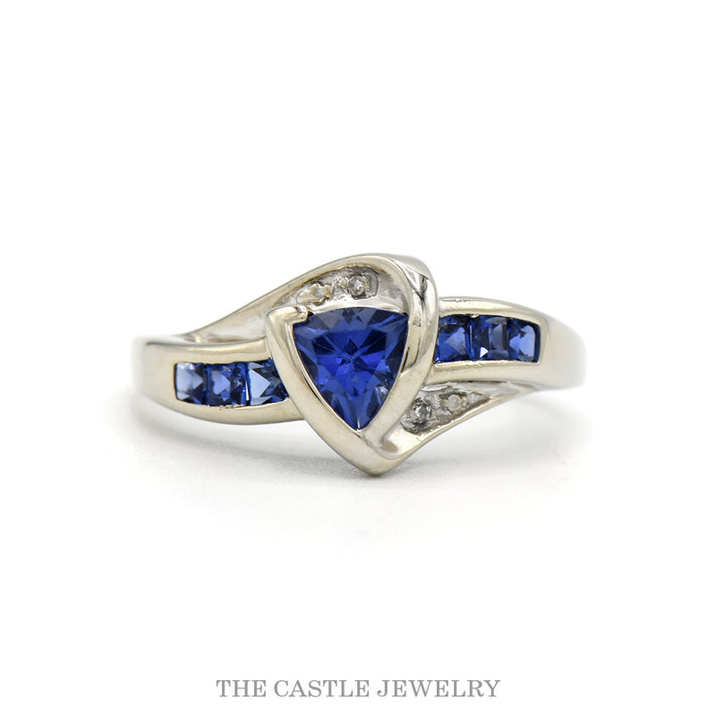 10k white gold trillion-cut tanzanite bypass ring with diamond accents — top view
