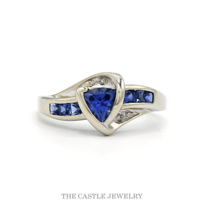 10k white gold trillion-cut tanzanite bypass ring with diamond accents — top view