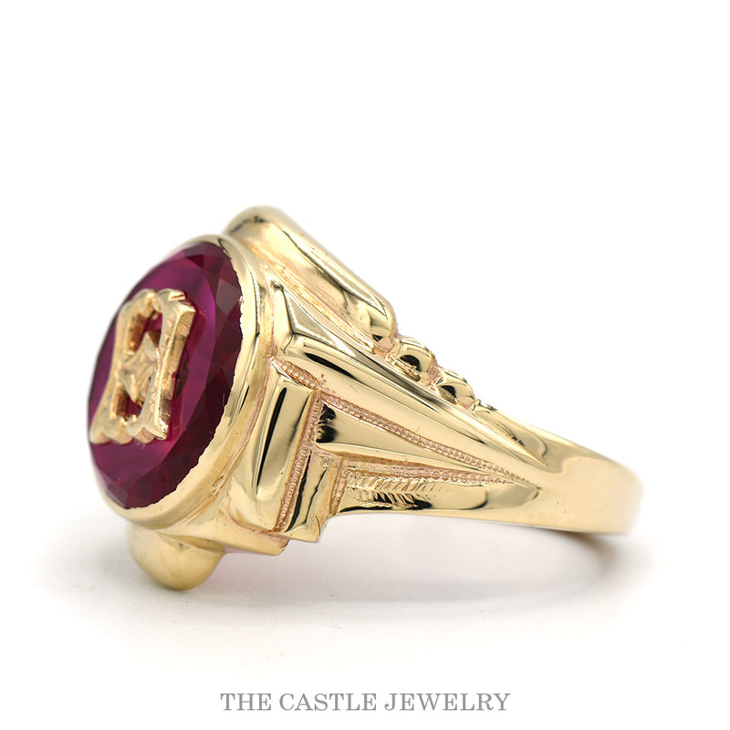 Side profile of the 10k yellow gold synthetic ruby initial ring showing bezel depth and band taper