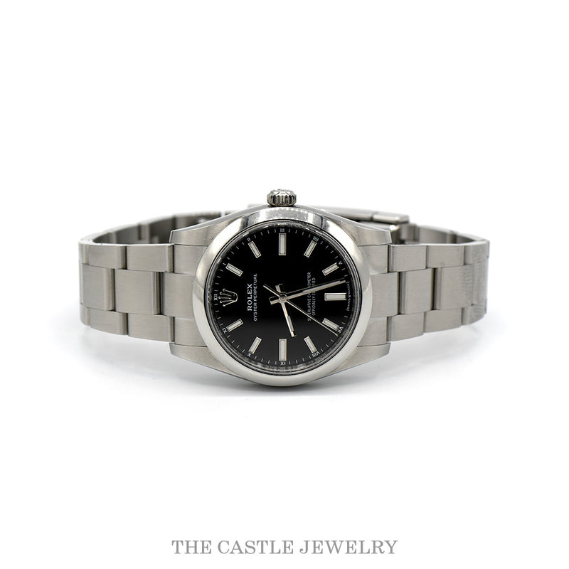 Top view of the Rolex Oyster Perpetual 34 showing the black dial and luminescent markers