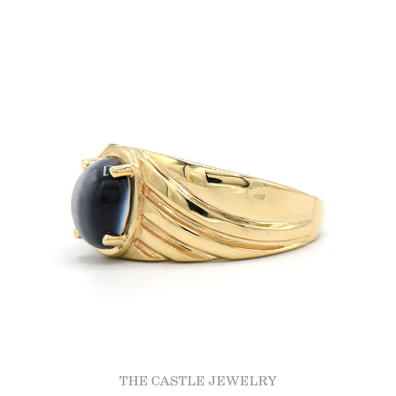 Side profile of the 10k yellow gold cat's-eye ring showing ridged band