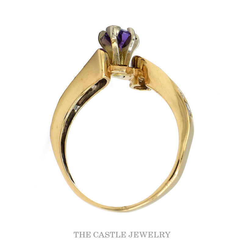 Front-facing view of the marquise amethyst bypass ring with channel-set diamond arms in 10k yellow gold