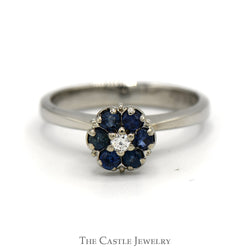 Sapphire And Diamond Flower Design Ring .05 CT Diamond Center In 14KT White Gold