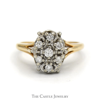Oval Shaped 7 Round Diamond Cluster Ring in 14k Yellow Gold