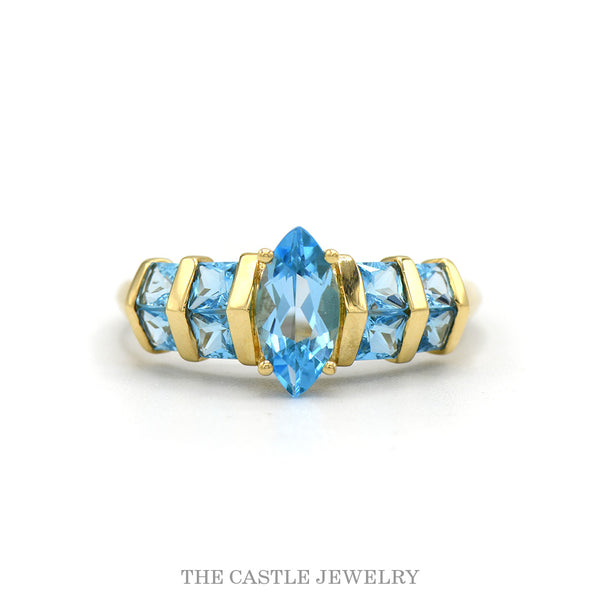 14k yellow gold marquise blue topaz row ring — top view
