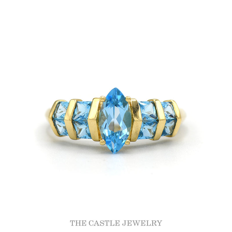 14k yellow gold marquise blue topaz row ring — top view