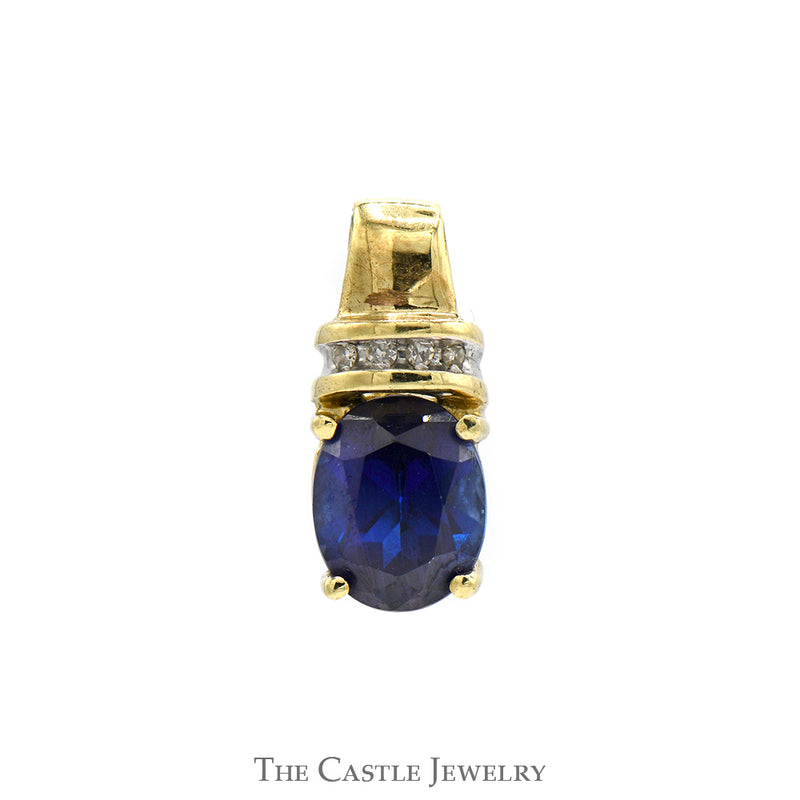 Oval Sapphire Pendant with Diamond Accents in 10k Yellow Gold