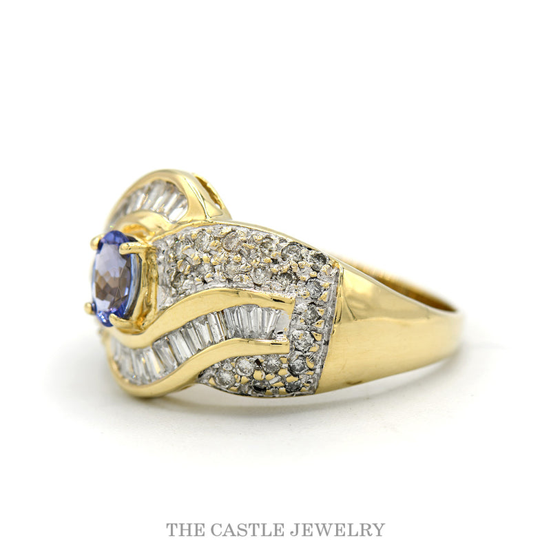 Oval Cut Tanzanite Ring with Round and Baguette Diamond Cluster Accents in 14k Yellow Gold