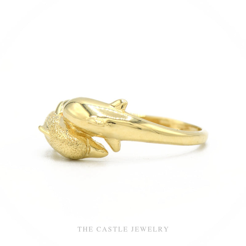 Side profile of the 14k yellow gold double dolphin bypass ring showing dolphin silhouette and shank