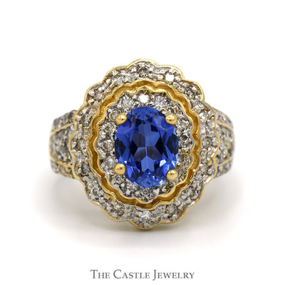 Oval Tanzanite Ring with 3/4cttw Diamond Accented Sides and Halo in 14k Yellow Gold