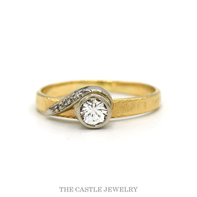 14k yellow gold bezel set diamond ring with illusion set accents — top view