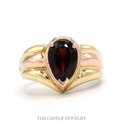 14k yellow gold pear garnet ring with grooved band — top view