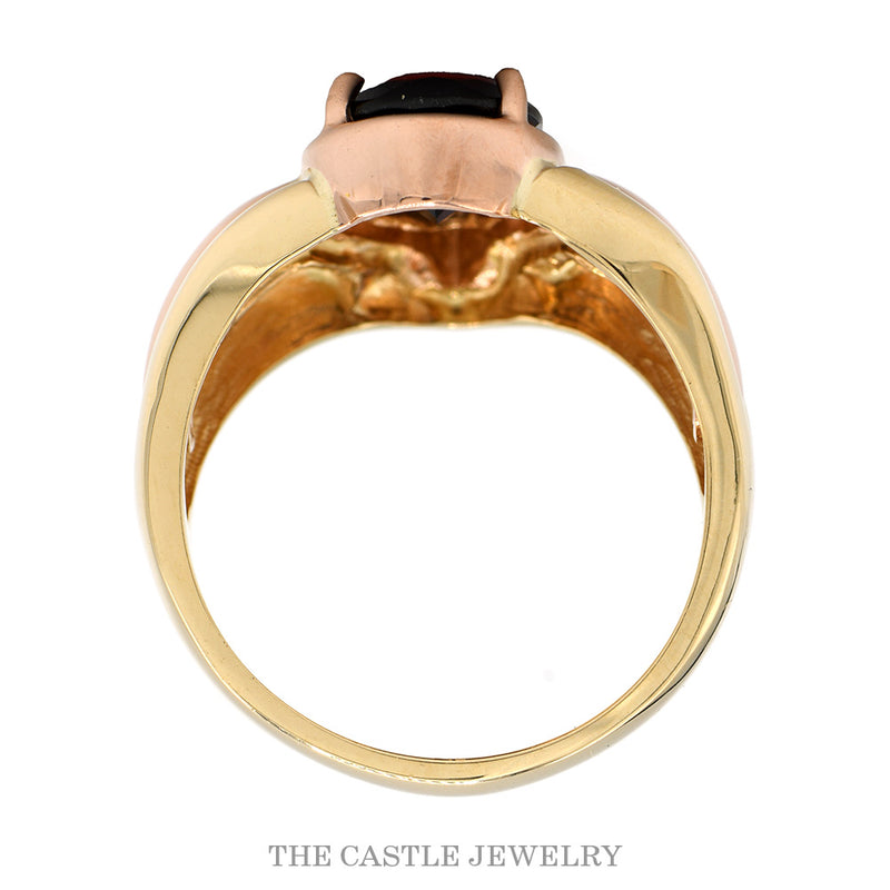 Front-facing view of the 14k yellow gold pear garnet ring