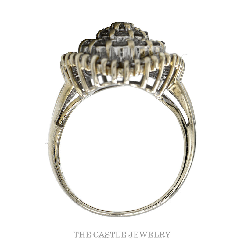 Front-facing view of the pear shaped round and baguette diamond ballerina ring in 14k white gold