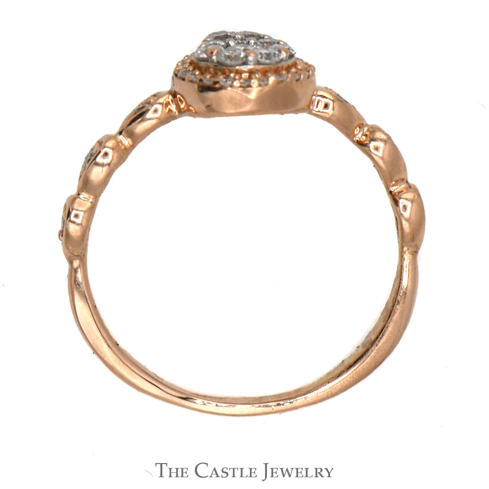 Pear Shaped Diamond Halo Cluster Ring With .25 CTTW Round Diamonds In 10KT Rose Gold