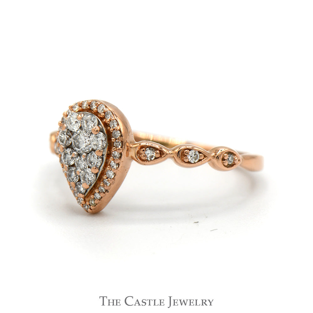 Pear Shaped Diamond Halo Cluster Ring With .25 CTTW Round Diamonds In 10KT Rose Gold
