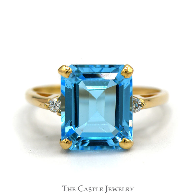 Emerald Cut Blue Topaz Ring with Round Diamond Accented Sides in 14k Yellow Gold