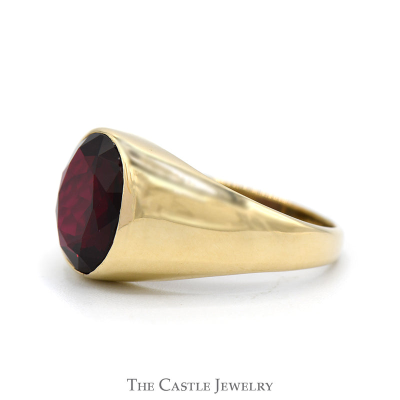Bezel Set Oval Garnet Ring with Polished Sides in 10k Yellow Gold